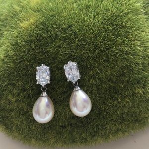 “Diamond and pearl drop earrings”!